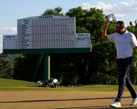 Scottie Scheffler falls a stroke short of a record Masters comeback after a flawless weekend