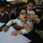 Suspected militants kill police officer assigned to guard polio team as nationwide campaign begins