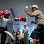 Humanoid robots show off their language and boxing skills in Hong Kong