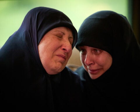 Hezbollah leader urges Lebanon's government to cancel Israel talks as battle rages in strategic town