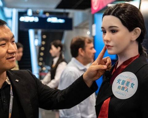 Humanoid robots show off their language and boxing skills in Hong Kong