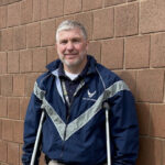 Injured police officer thrown from semi truck searches for the woman who prayed for him