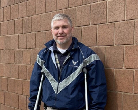 Injured police officer thrown from semi truck searches for the woman who prayed for him