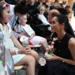 Prince Harry and Meghan arrive in Australia for a low-key, privately funded visit