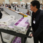 Postal Service union launches ad campaign promoting mail voting as Trump assails the method