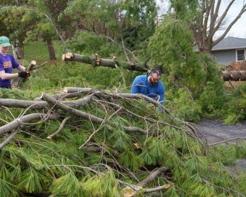 Severe storms accompanied by tornadoes damage communities from the Plains to the Midwest