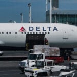Delta Air Lines scales back sustainable fuel and net-zero targets, Bloomberg News Reports