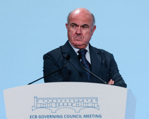 ECB rate rise will depend on effects of oil price surge, De Guindos says