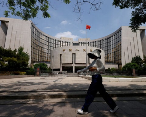 China March new loans jumps less than expected, no sign of fresh policy easing