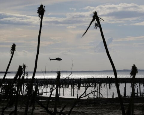 Bahamas police arrest Michigan man after wife vanishes at sea