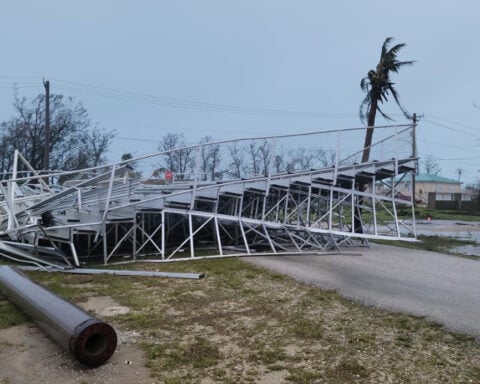 Typhoon flipped over cars and ripped away roofs on US islands in the Pacific Ocean