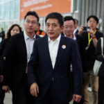 China's vice commerce minister meets Ford executive, urges deeper market presence