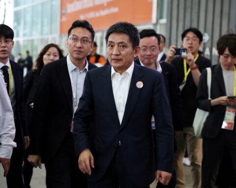 China's vice commerce minister meets Ford executive, urges deeper market presence