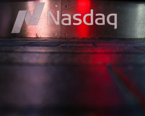 Nasdaq sets record highs as investors return to tech stocks