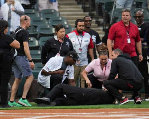 Singer leading Jackie Robinson festivities collapses before White Sox game against Rays