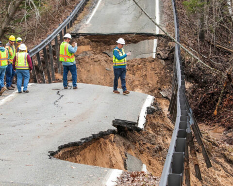 Floodwaters inundate Wisconsin streets, trapping drivers, as Midwest rebuilds after storms