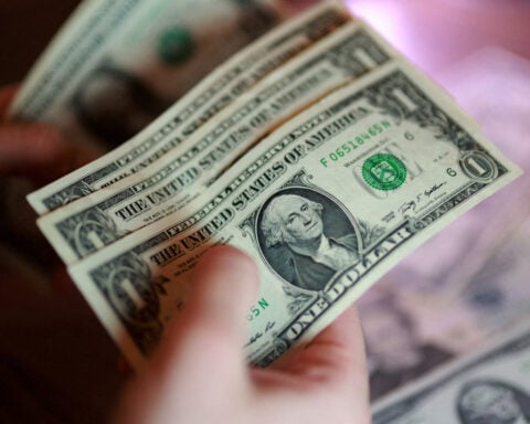 Dollar holds firm ahead of Trump's Iran deadline