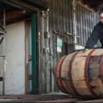 Bourbon demand is down and tariffs aren't helping. But distillers keep building