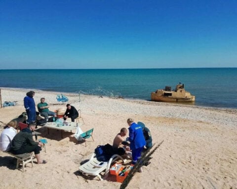 Russian grain ship believed sunk in Ukrainian drone attack is found and towed to shore, TASS says