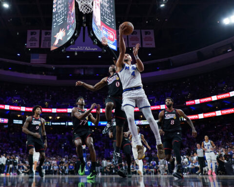 Joel Embiid provides an emotional lift and Tyrese Maxey carries the 76ers into the playoffs
