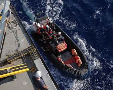 Ships near Italy rescue 32 migrants, 71 lost at sea, charities say