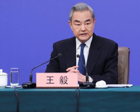 China ready to cooperate with Russia to ease Middle East tension, foreign minister says