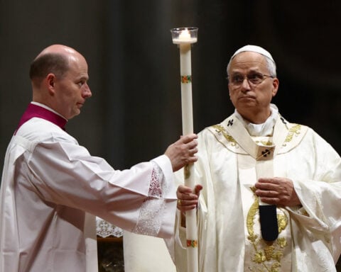 At Easter vigil, Pope Leo urges world not to grow numb to war