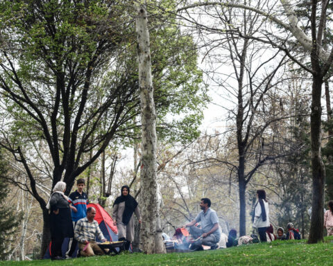 Iran leaders join crowds on Tehran's streets to project control in wartime