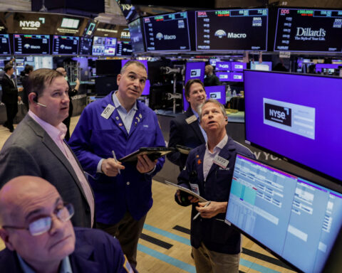 Wall Street ends mixed as worries linger before Good Friday break