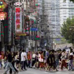 China services activity growth cools in March, private PMI shows