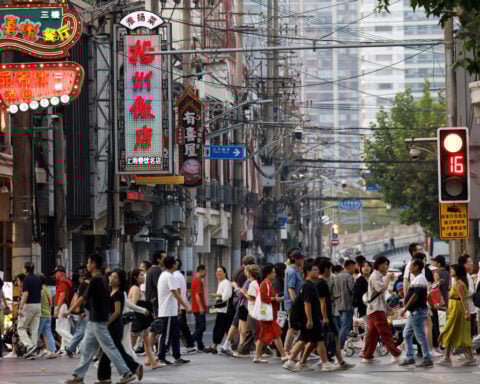 China services activity growth cools in March, private PMI shows