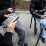 Switch off and read, France's Macron tells teenagers