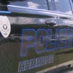 Police say teen shot father in school car line after argument