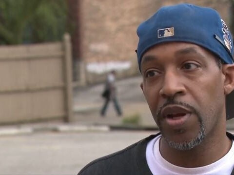 Man escapes waist-deep floodwater after rideshare gets stuck under bridge