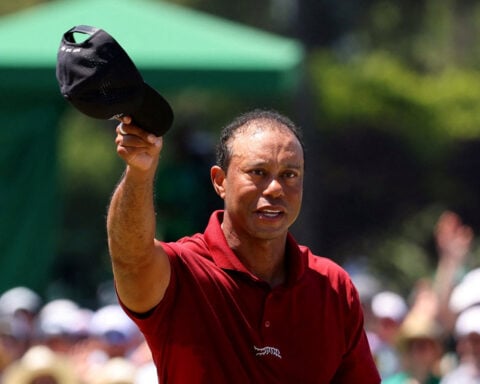 Golf-Woods stepping away for treatment after DUI arrest, will miss Masters