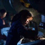 China's factory activity expands but price pressures intensify, private PMI shows