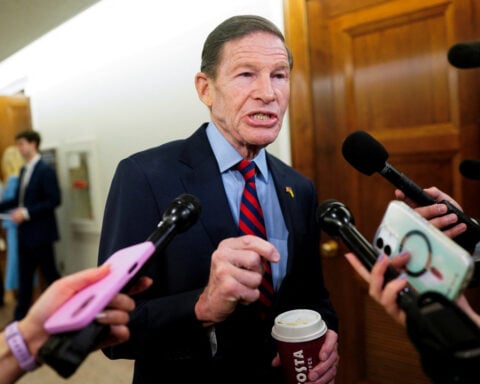 US lawmakers press SEC's top official over enforcement director's exit