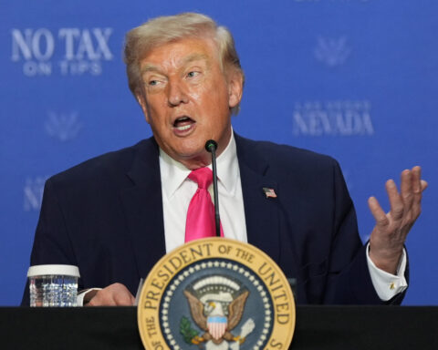 Trump bets his tax cuts will please Las Vegas voters on his swing West