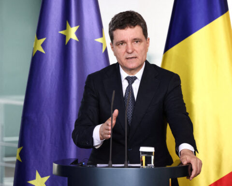 Romanian broad ruling coalition parties must continue despite tensions, president says