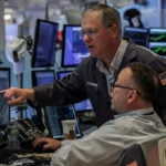 Surging record-high US stocks to wade deeper into earnings season