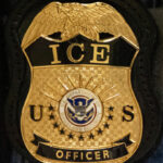 France's foreign minister says 85-year-old widow detained by ICE returns home