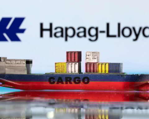 Reactions of industry and leaders to Iran saying Hormuz is open