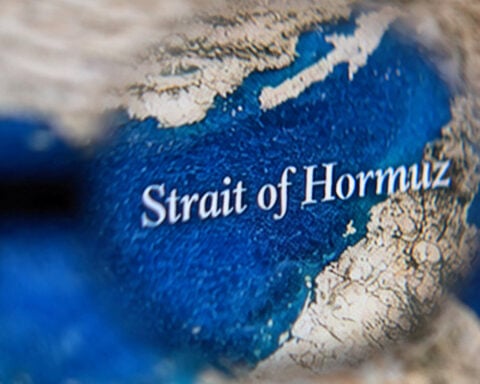 Ships crossing Hormuz need IRGC OK, unfreezing of assets part of deal, Iran official says