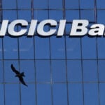 Indian refiners pay for Iran oil in yuan via ICICI Bank, sources say