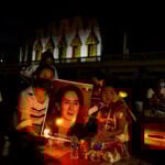 Myanmar cuts ex-leader Aung San Suu Kyi's sentence, frees former president