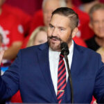 Judge sides with Arizona election official in ruling that has implications for midterms voting