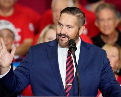 Judge sides with Arizona election official in ruling that has implications for midterms voting