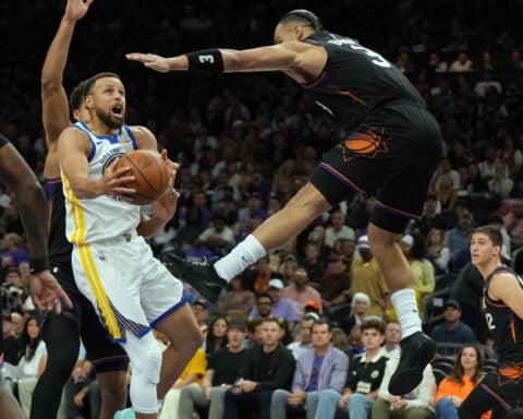 Green scores 36 points, Suns lock down Warriors, Curry in 111-96 win in NBA's play-in tourney