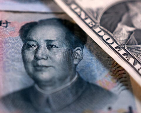 Indian refiners pay for Iran oil in yuan via ICICI Bank, sources say