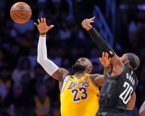 Kennard scores 27, LeBron leads Lakers to surprising 107-98 win over Rockets in playoff opener